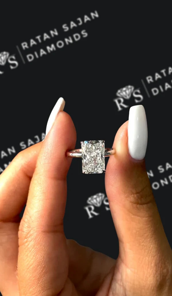 Two and a half carat radiant natural diamond solitaire engagement ring