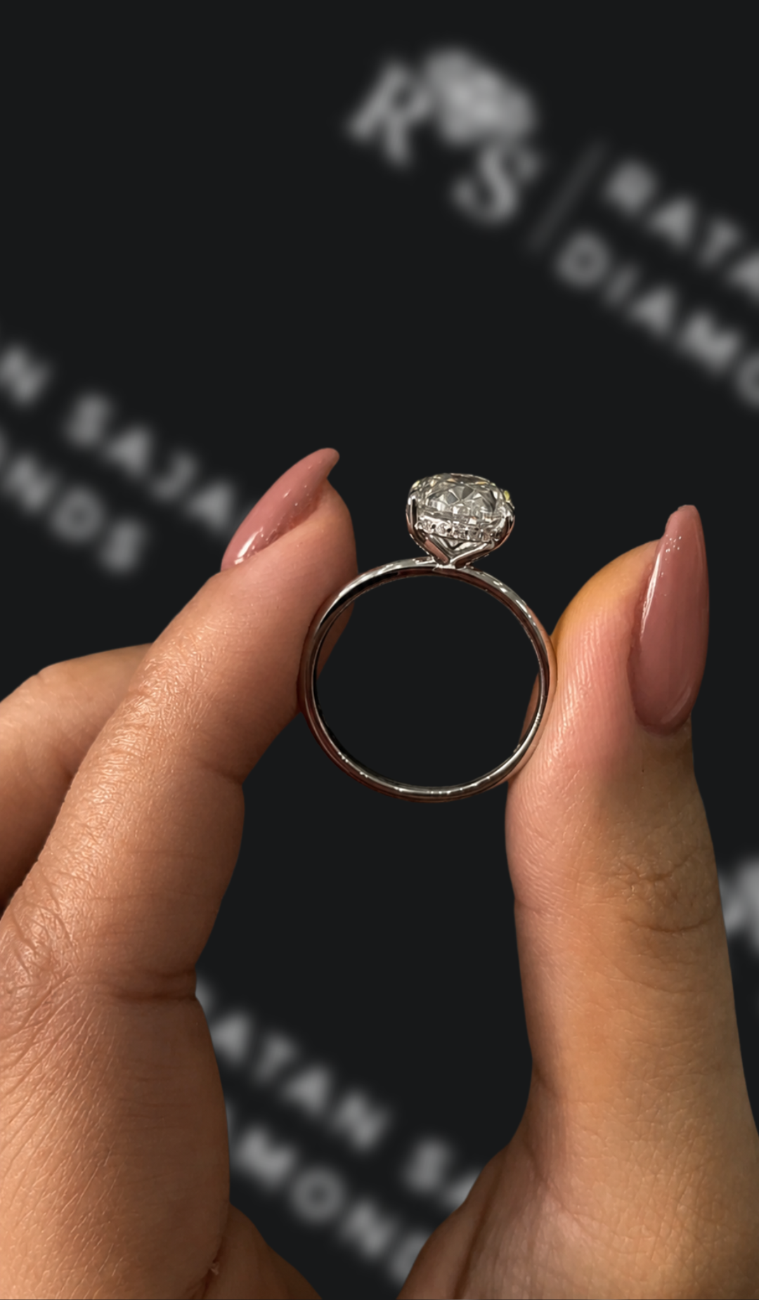 2.5 carat oval natural diamond engagement ring by Ratan Sajan Diamonds Dubai