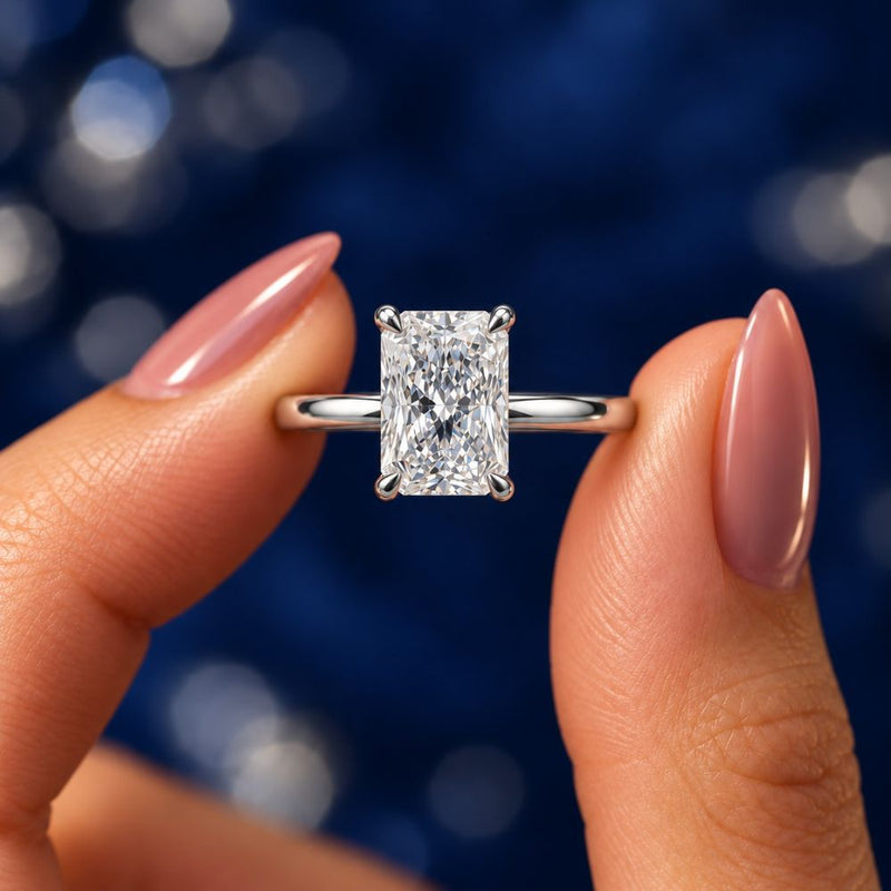 Two and a half carat pear natural diamond trilogy engagement ring