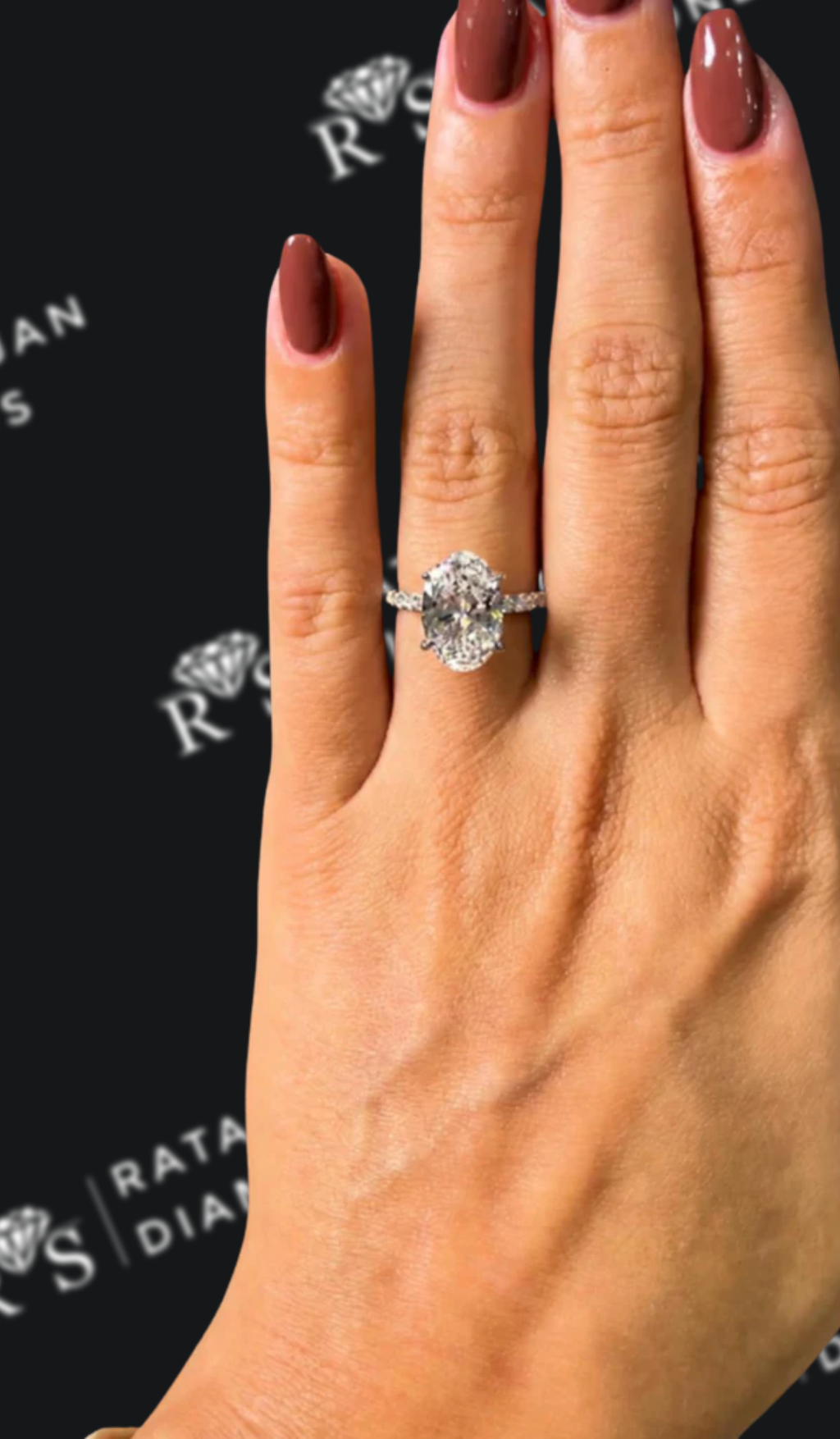 2.5 carat oval natural diamond engagement ring by Ratan Sajan Diamonds Dubai
