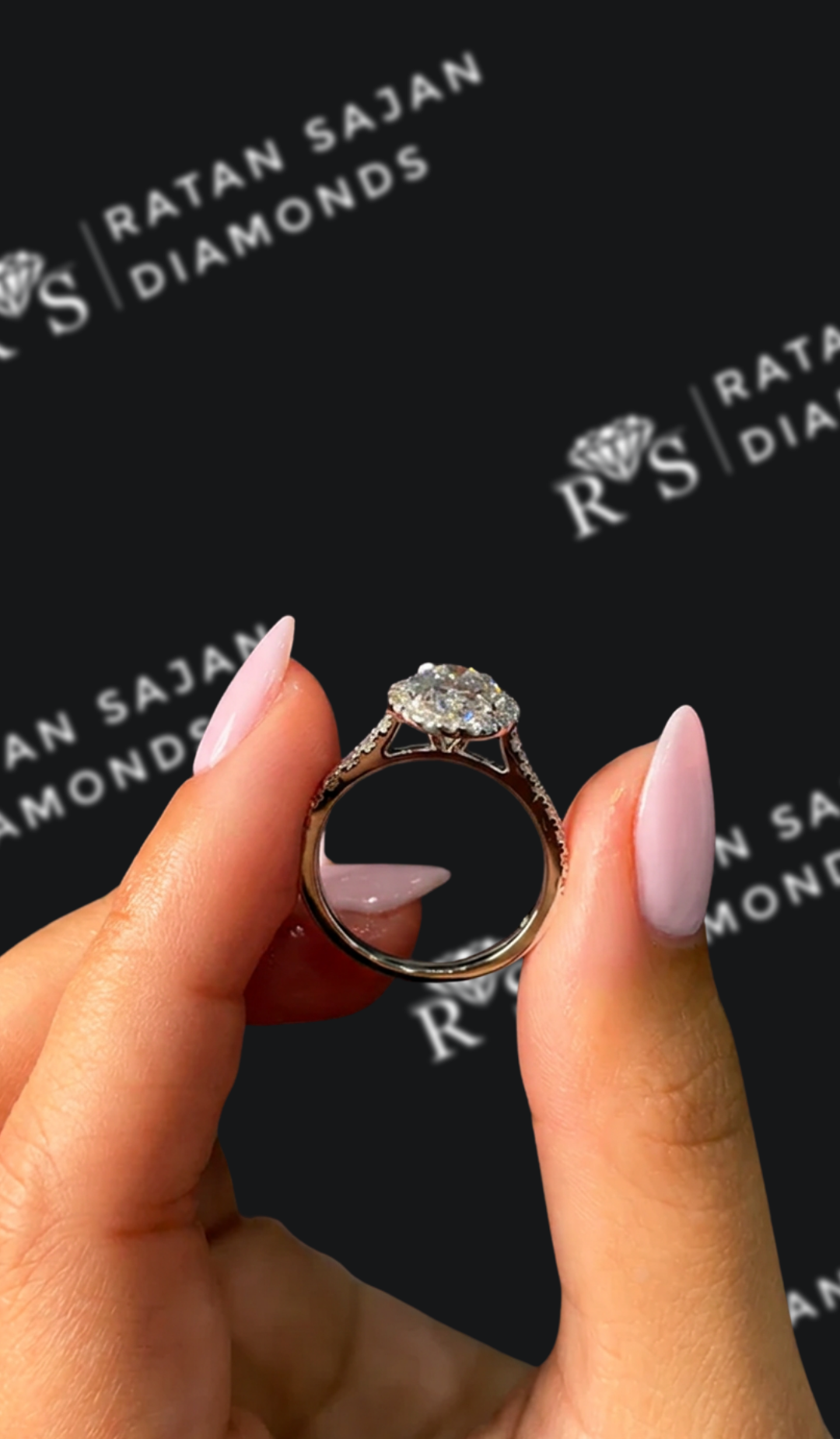 1.5 carat oval natural diamond engagement ring by Ratan Sajan Diamonds Dubai
