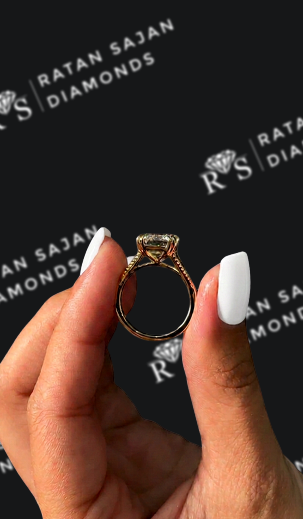 4 carat emerald cut natural diamond engagement ring by Ratan Sajan Diamonds Dubai