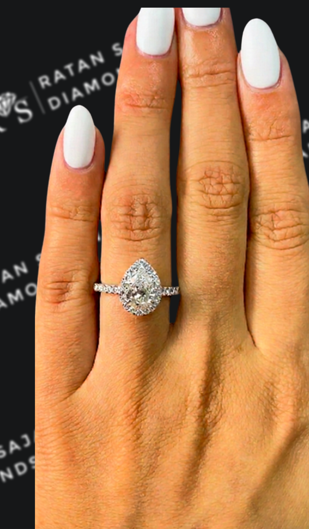 1 carat pear shaped natural diamond engagement ring by Ratan Sajan Diamonds Dubai