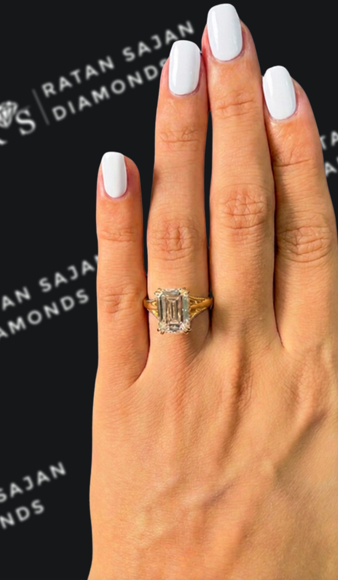 4 carat emerald cut natural diamond engagement ring by Ratan Sajan Diamonds Dubai