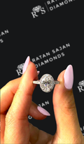 1.5 carat oval natural diamond engagement ring by Ratan Sajan Diamonds Dubai
