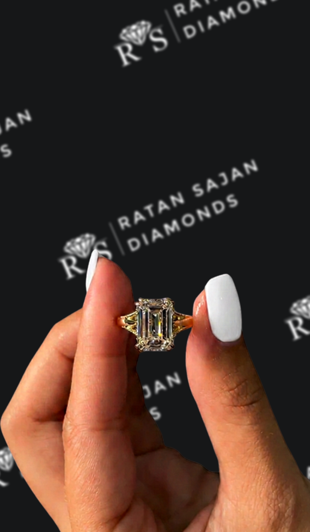 4 carat emerald cut natural diamond engagement ring by Ratan Sajan Diamonds Dubai