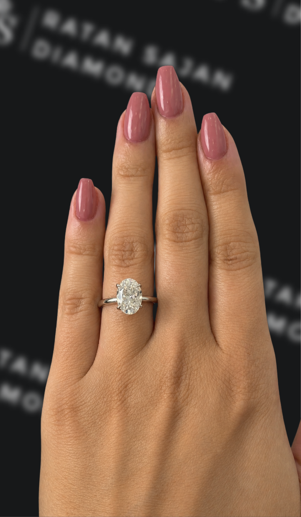 2.5 carat oval natural diamond engagement ring by Ratan Sajan Diamonds Dubai