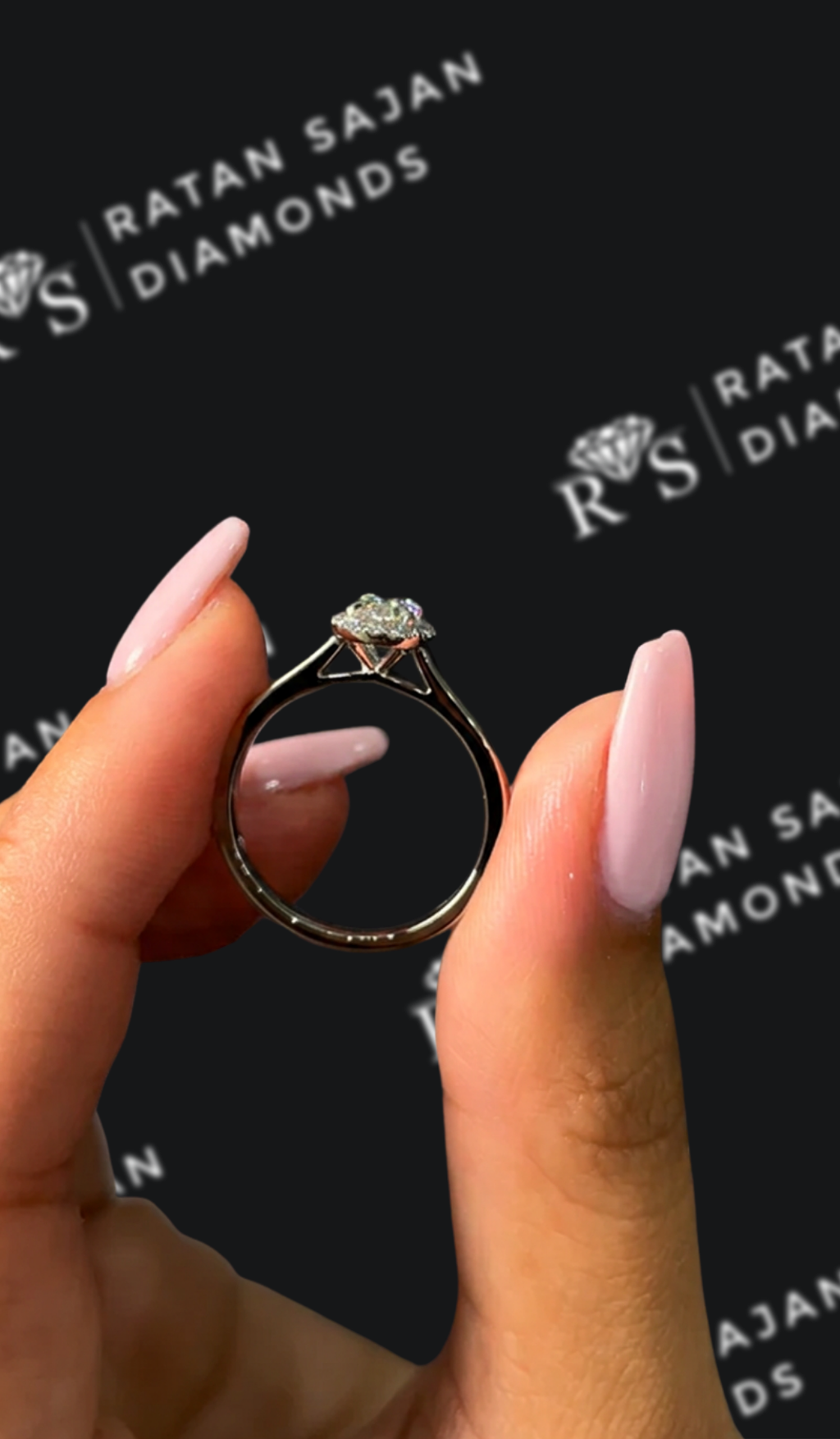 0.5 carat oval natural diamond engagement ring by Ratan Sajan Diamonds Dubai