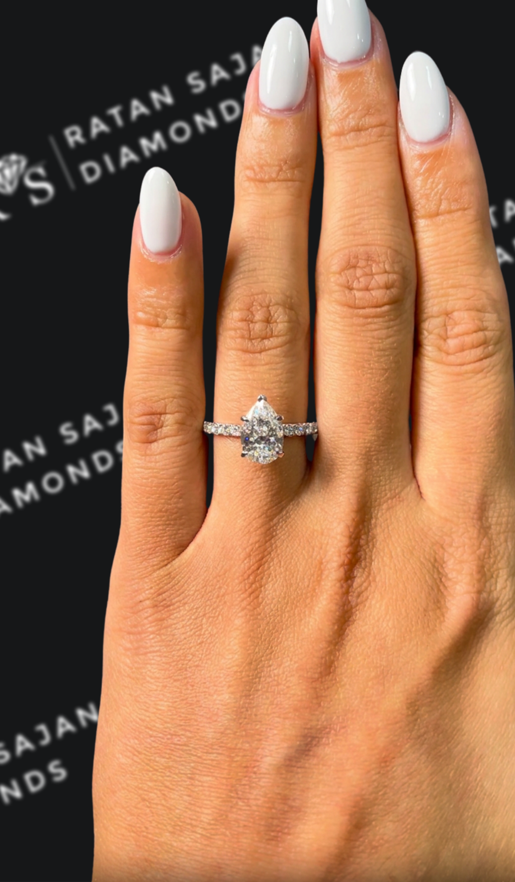 1.5 carat pear shaped natural diamond engagement ring by Ratan Sajan Diamonds Dubai