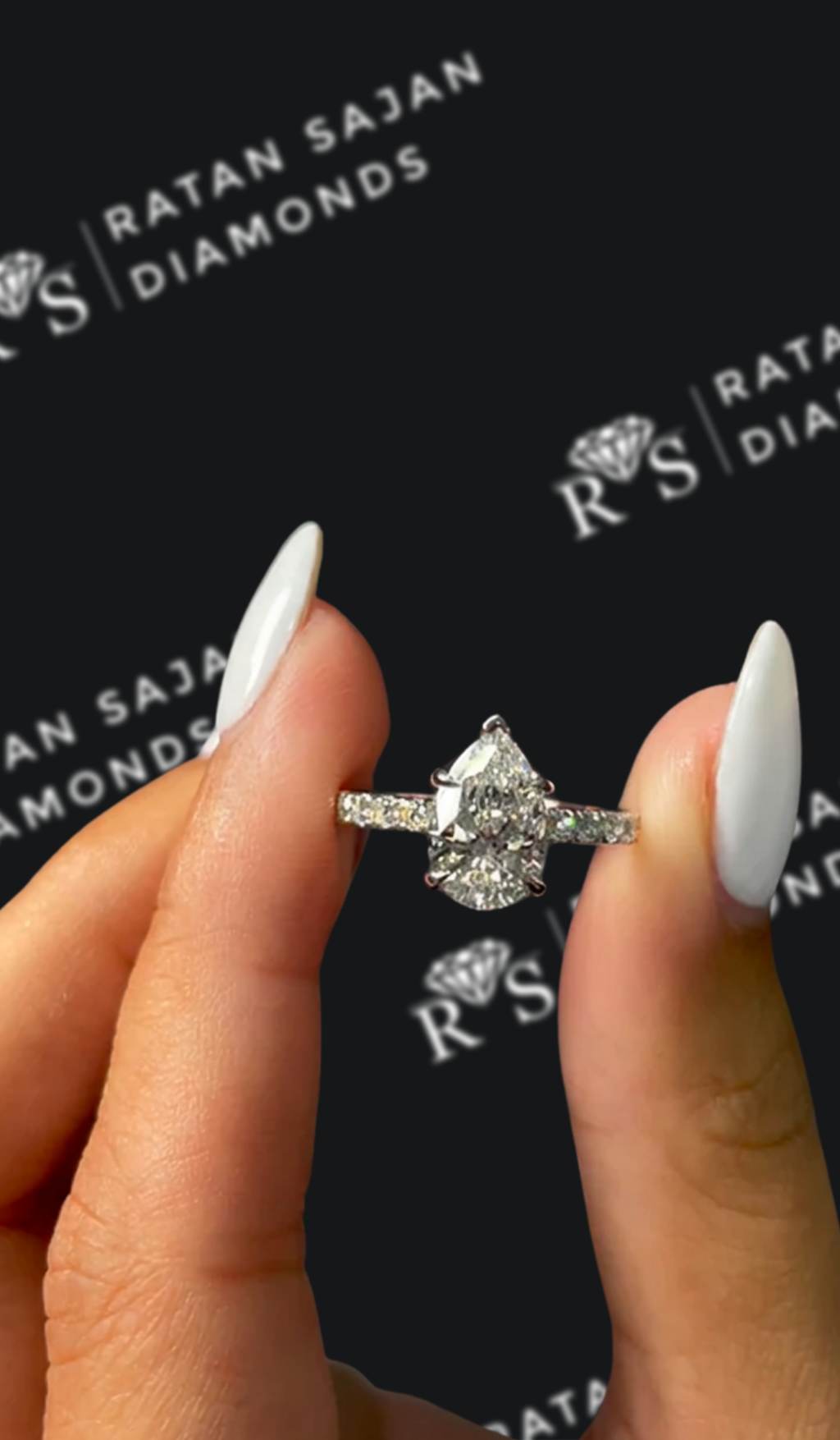1.5 carat pear shaped natural diamond engagement ring by Ratan Sajan Diamonds Dubai
