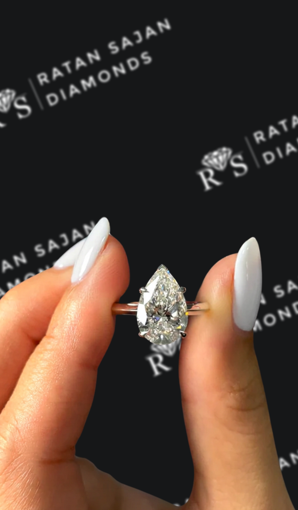 3 carat pear shaped natural diamond engagement ring by Ratan Sajan Diamonds Dubai