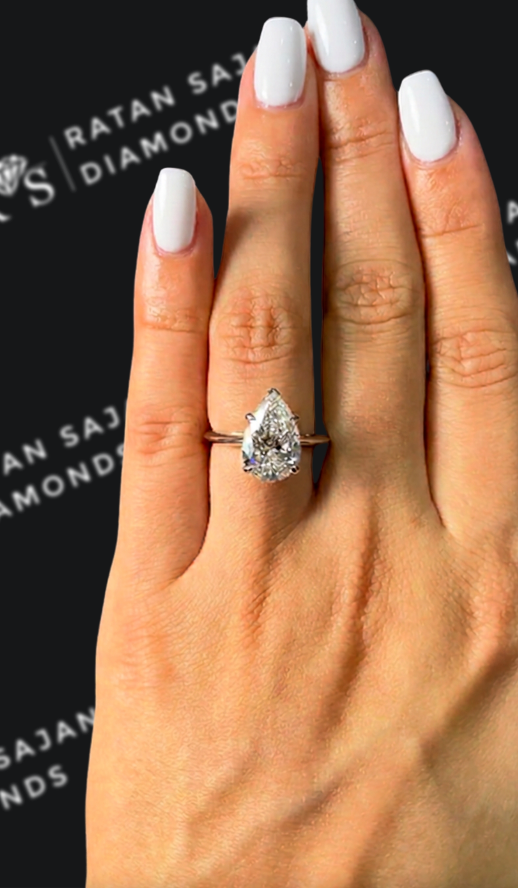 3 carat pear shaped natural diamond engagement ring by Ratan Sajan Diamonds Dubai
