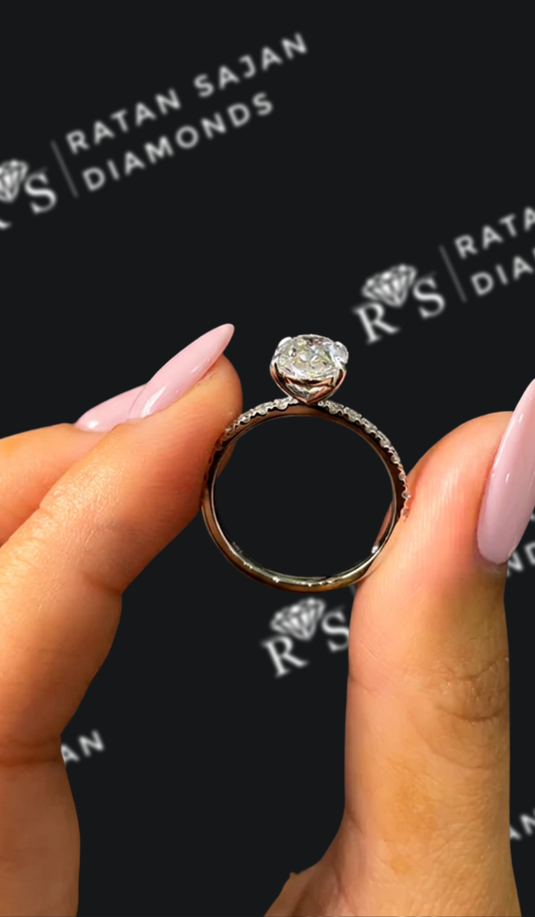 1.5 carat oval natural diamond engagement ring by Ratan Sajan Diamonds Dubai