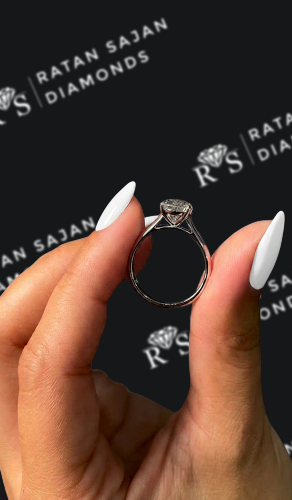 1.5 carat pear shaped natural diamond engagement ring by Ratan Sajan Diamonds Dubai