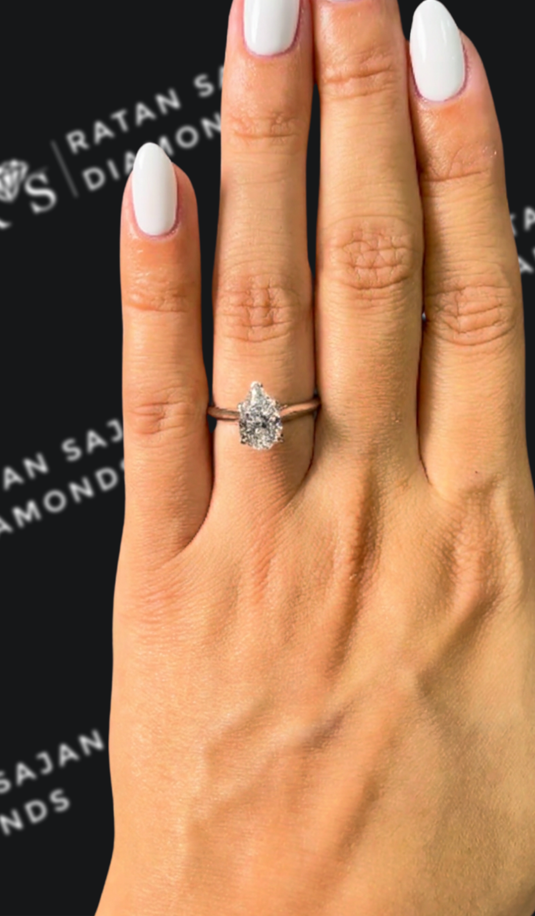 1.5 carat pear shaped natural diamond engagement ring by Ratan Sajan Diamonds Dubai