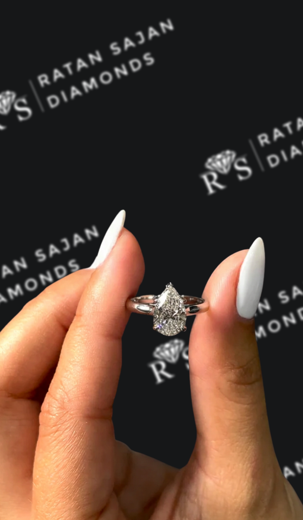 1.5 carat pear shaped natural diamond engagement ring by Ratan Sajan Diamonds Dubai