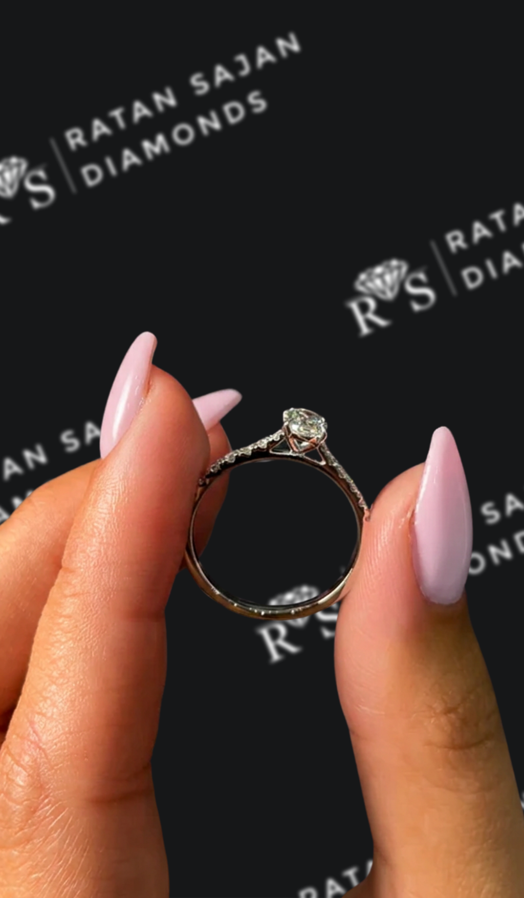 0.5 carat oval natural diamond engagement ring by Ratan Sajan Diamonds Dubai