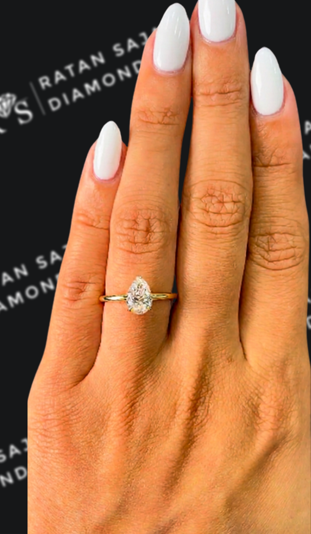 1 carat pear shaped natural diamond engagement ring by Ratan Sajan Diamonds Dubai