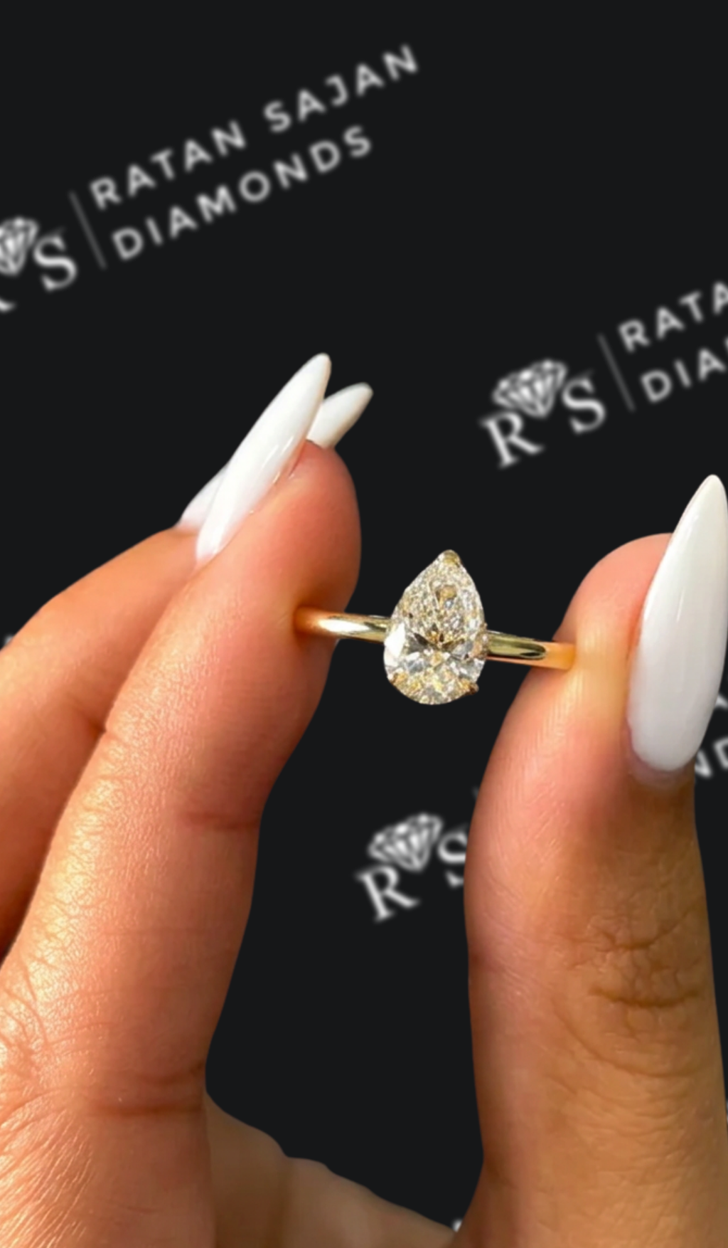1 carat pear shaped natural diamond engagement ring by Ratan Sajan Diamonds Dubai