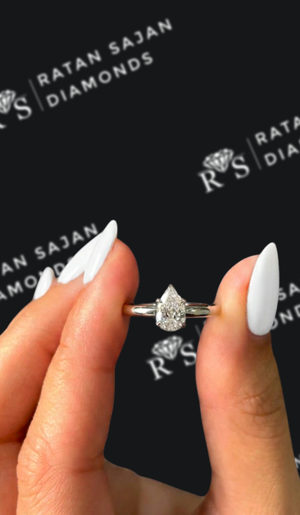 0.5 carat pear shaped natural diamond engagement ring by Ratan Sajan Diamonds Dubai