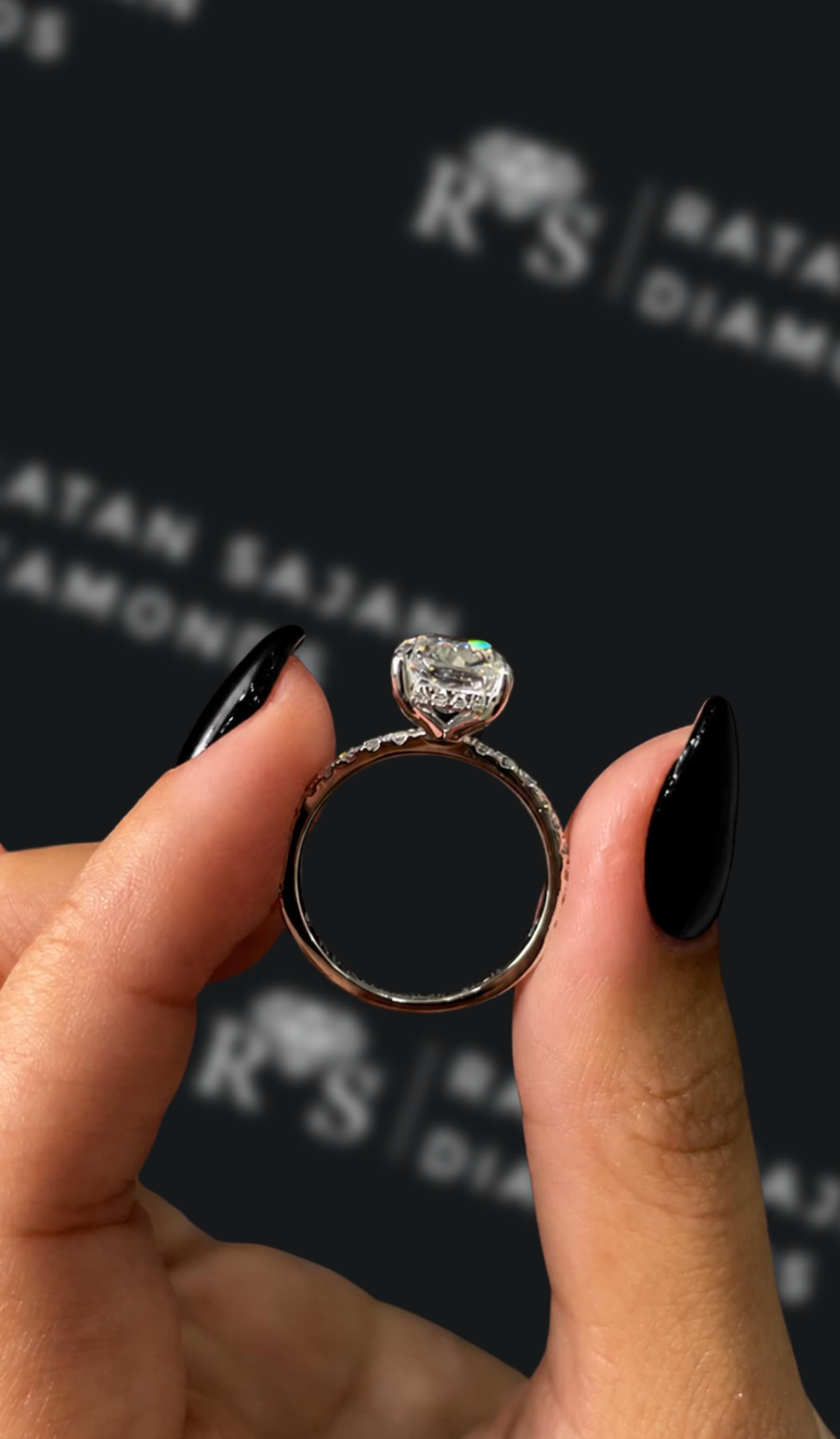 1.5 carat emerald cut natural diamond engagement ring by Ratan Sajan Diamonds Dubai