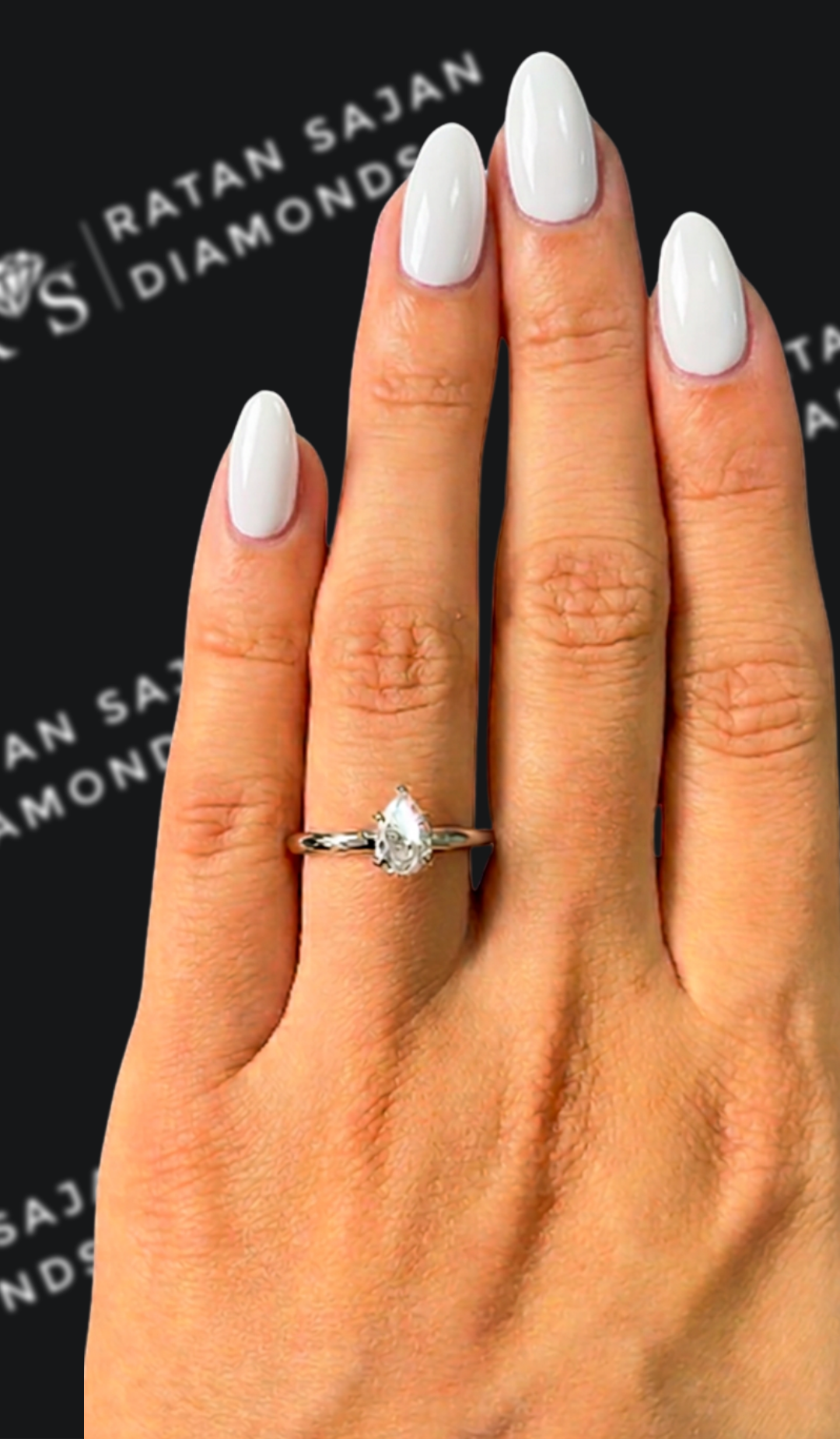 0.5 carat pear shaped natural diamond engagement ring by Ratan Sajan Diamonds Dubai