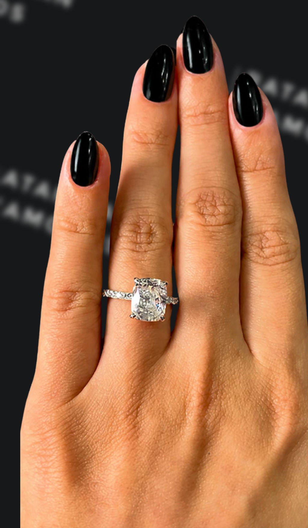 1.5 carat emerald cut natural diamond engagement ring by Ratan Sajan Diamonds Dubai