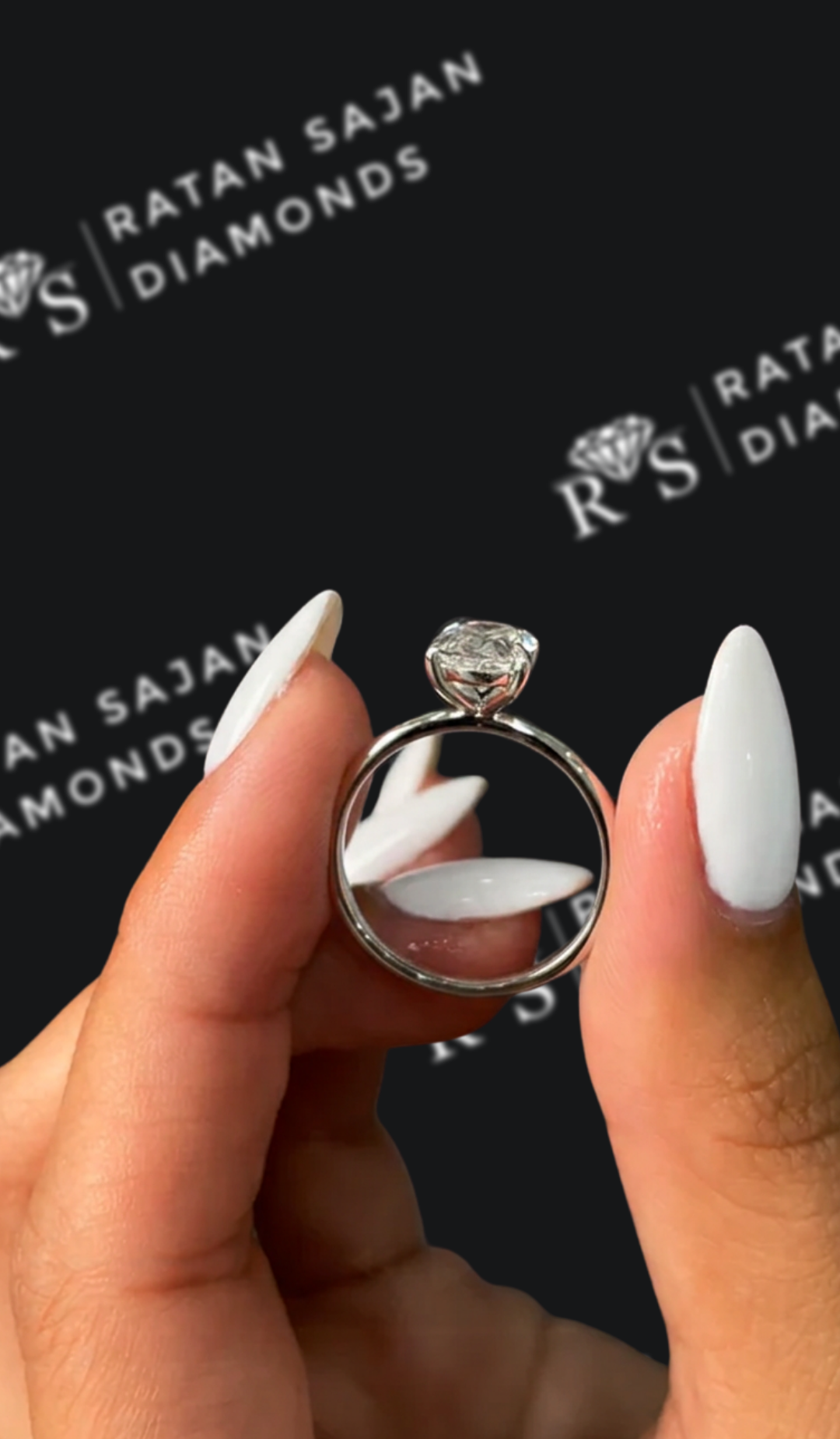 1.5 carat oval natural diamond engagement ring by Ratan Sajan Diamonds Dubai