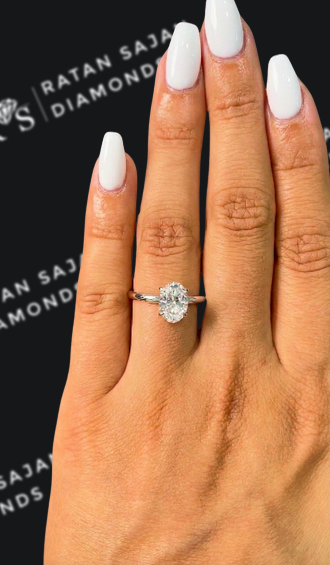1.5 carat oval natural diamond engagement ring by Ratan Sajan Diamonds Dubai