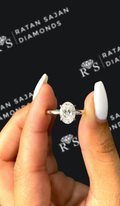 1.5 carat oval natural diamond engagement ring by Ratan Sajan Diamonds Dubai