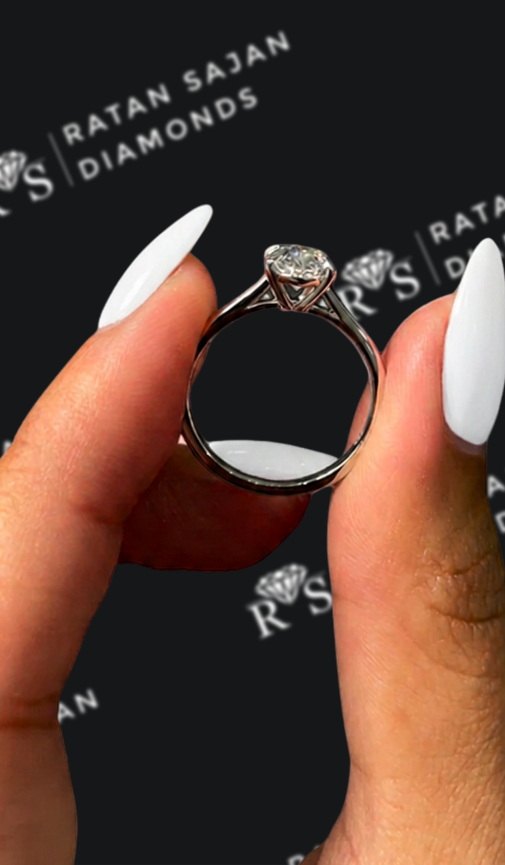 1 carat oval natural diamond engagement ring by Ratan Sajan Diamonds Dubai