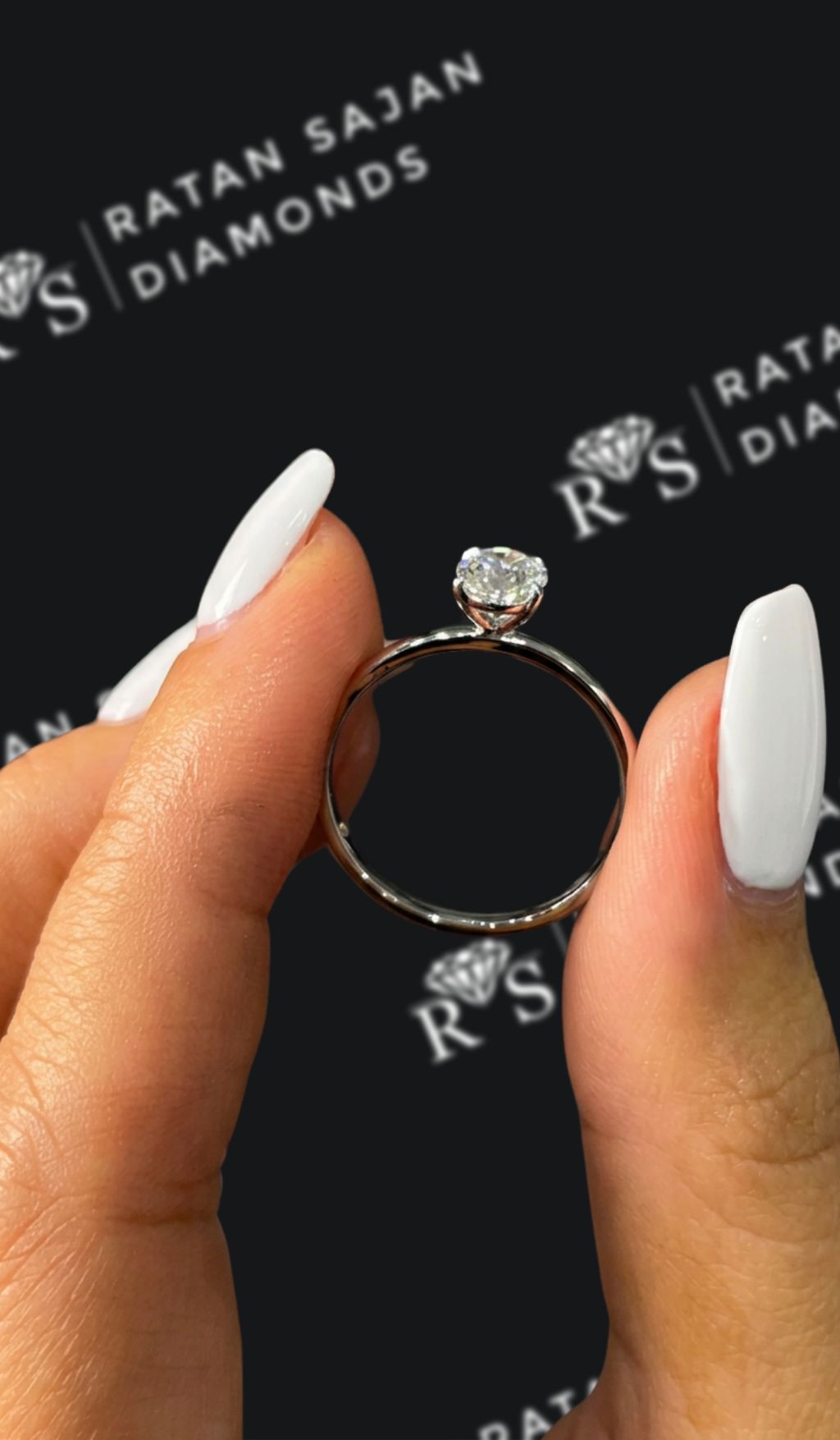 0.5 carat oval natural diamond engagement ring by Ratan Sajan Diamonds Dubai