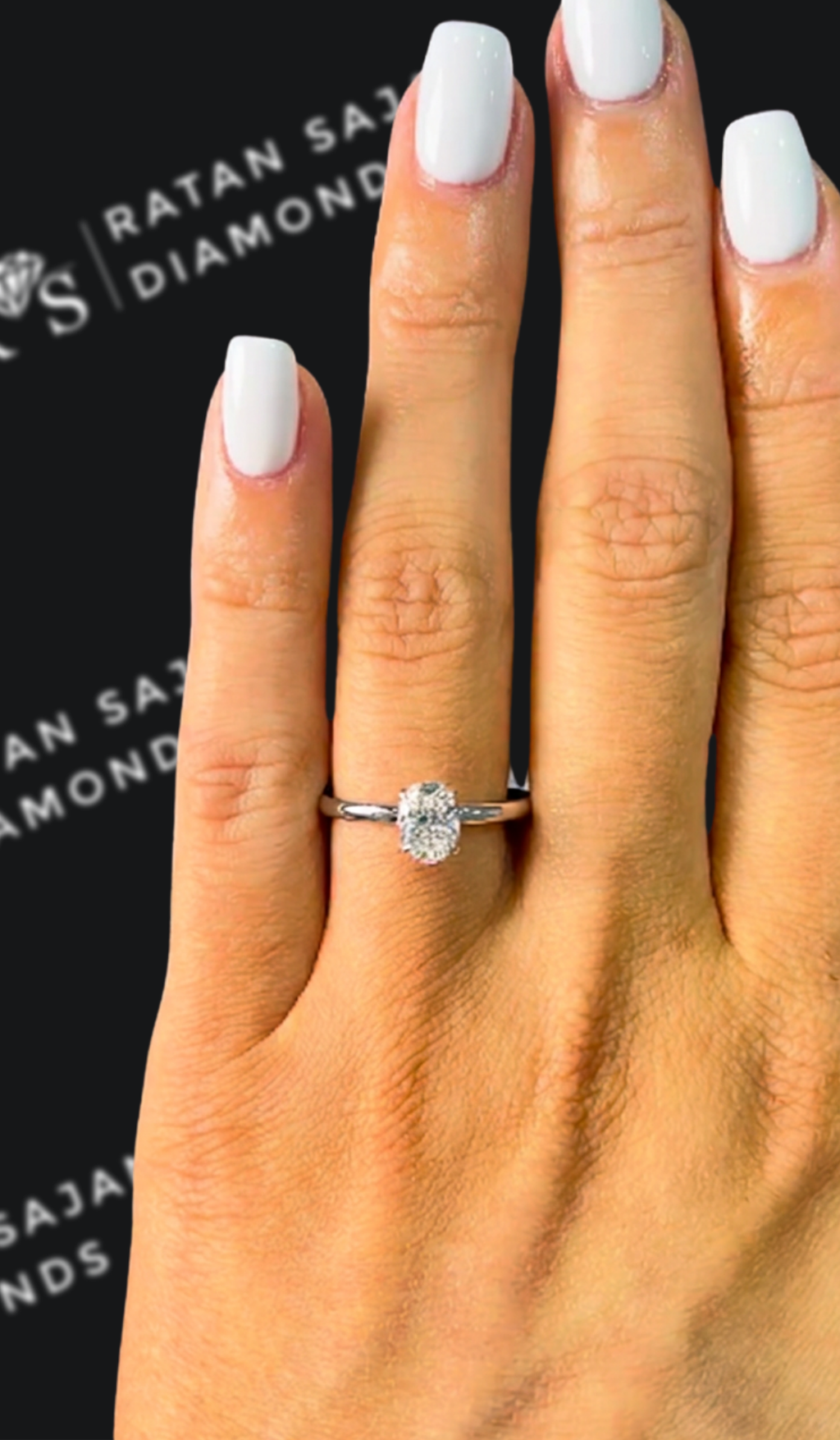 0.5 carat oval natural diamond engagement ring by Ratan Sajan Diamonds Dubai