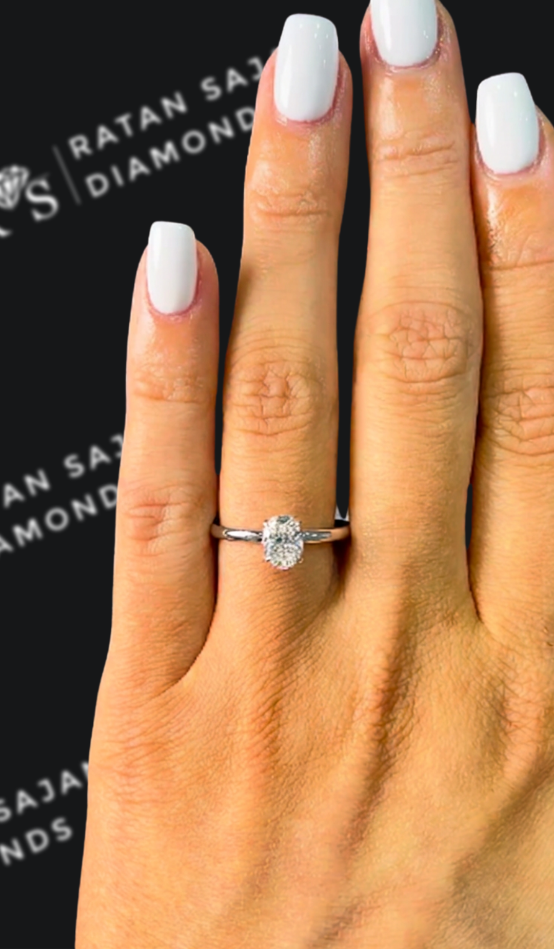 0.5 carat oval natural diamond engagement ring by Ratan Sajan Diamonds Dubai