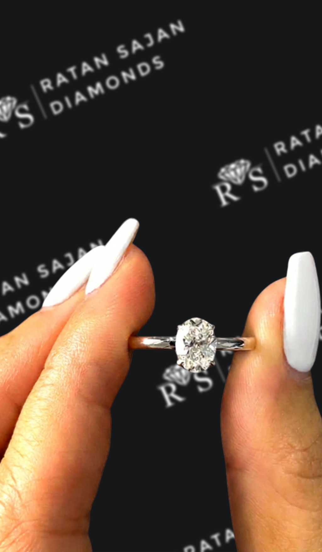 0.5 carat oval natural diamond engagement ring by Ratan Sajan Diamonds Dubai