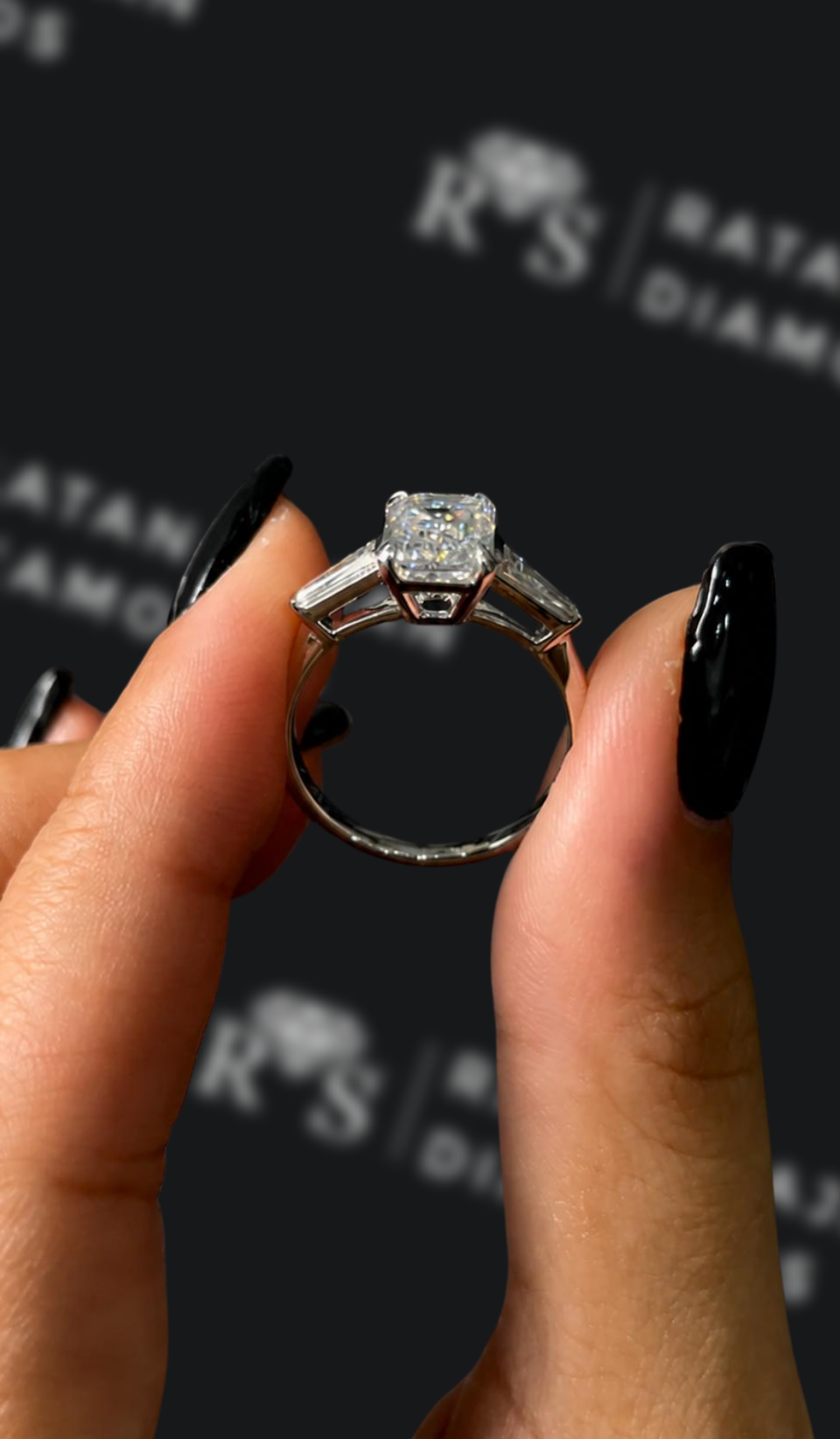 1.5 carat emerald cut natural diamond engagement ring by Ratan Sajan Diamonds Dubai