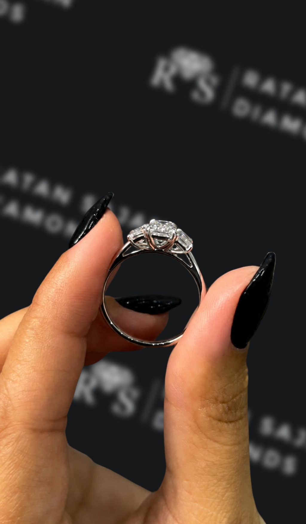 2 carat emerald cut natural diamond engagement ring by Ratan Sajan Diamonds Dubai