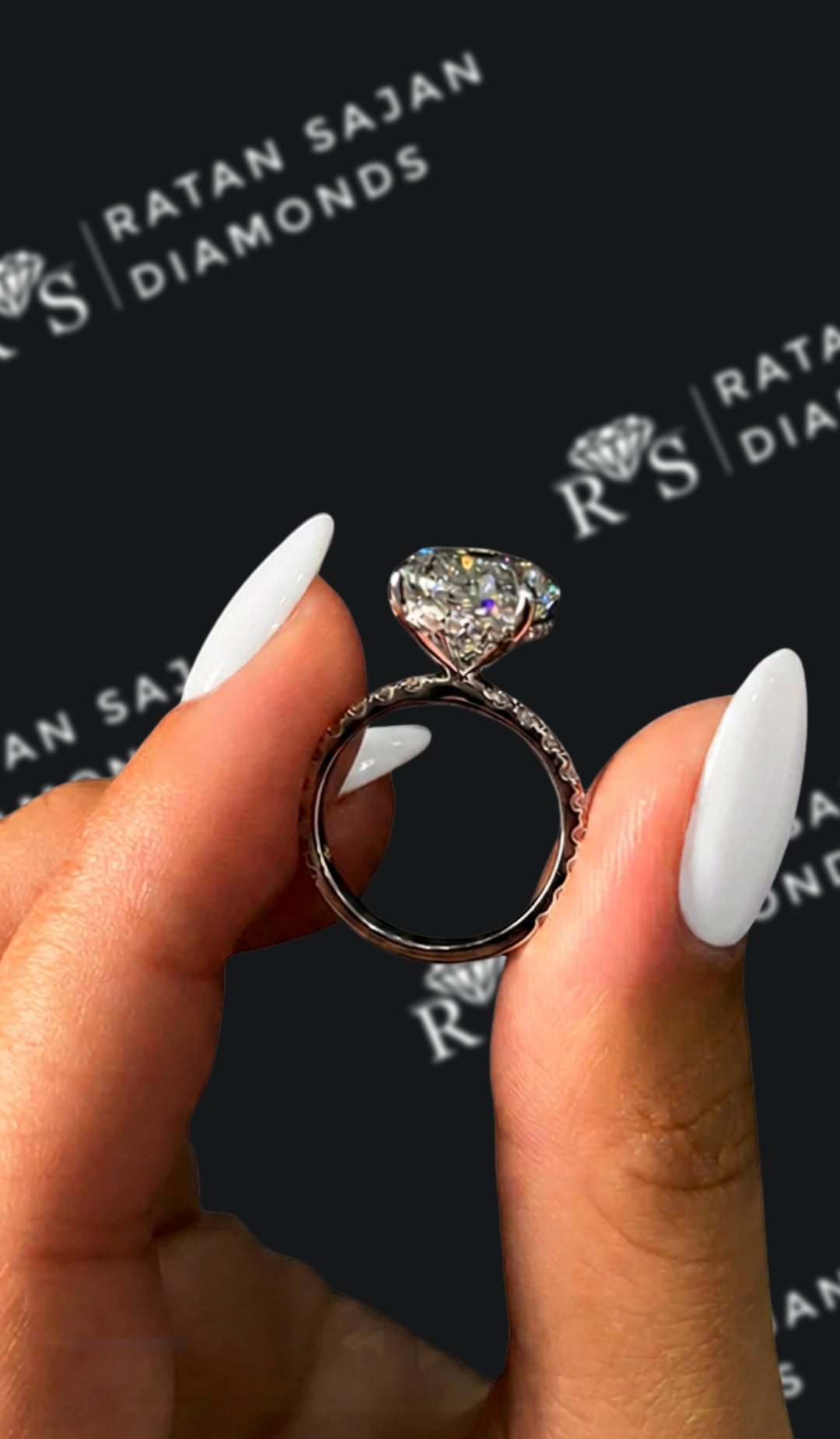 5 carat oval natural diamond engagement ring by Ratan Sajan Diamonds Dubai