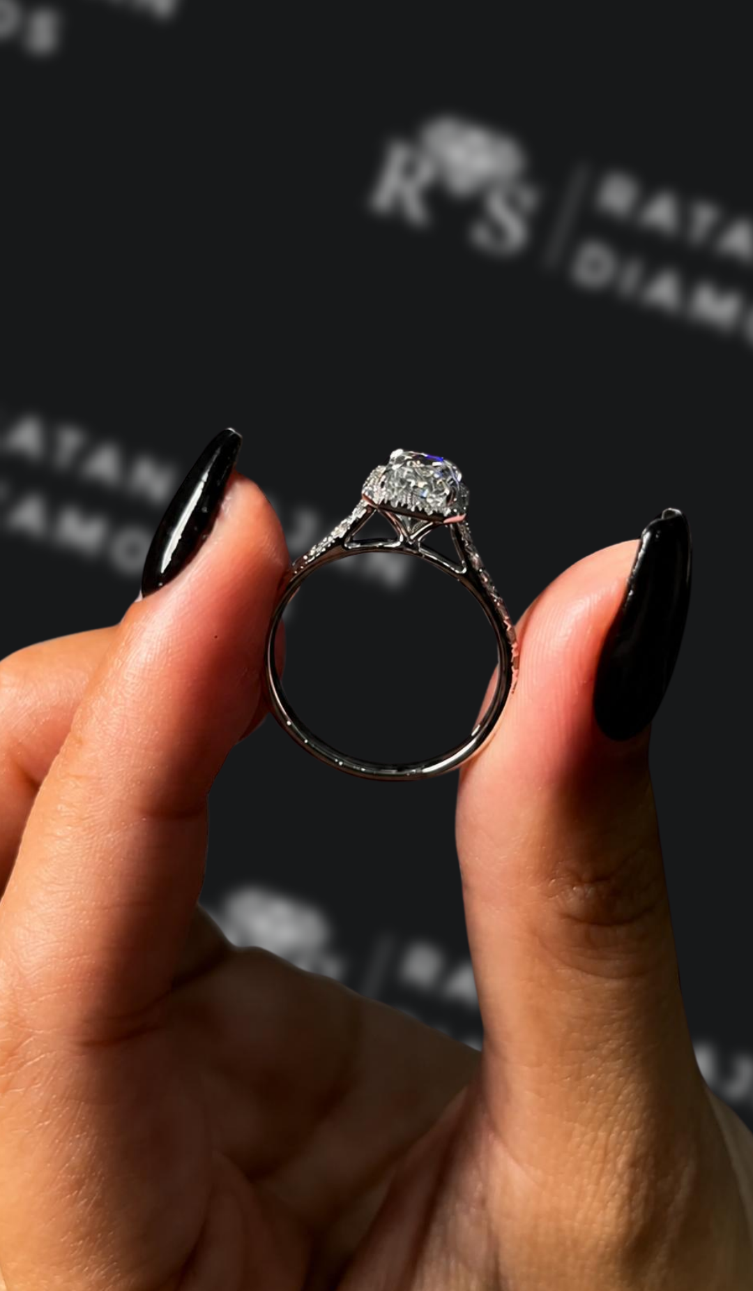 2 carat emerald cut natural diamond engagement ring by Ratan Sajan Diamonds Dubai