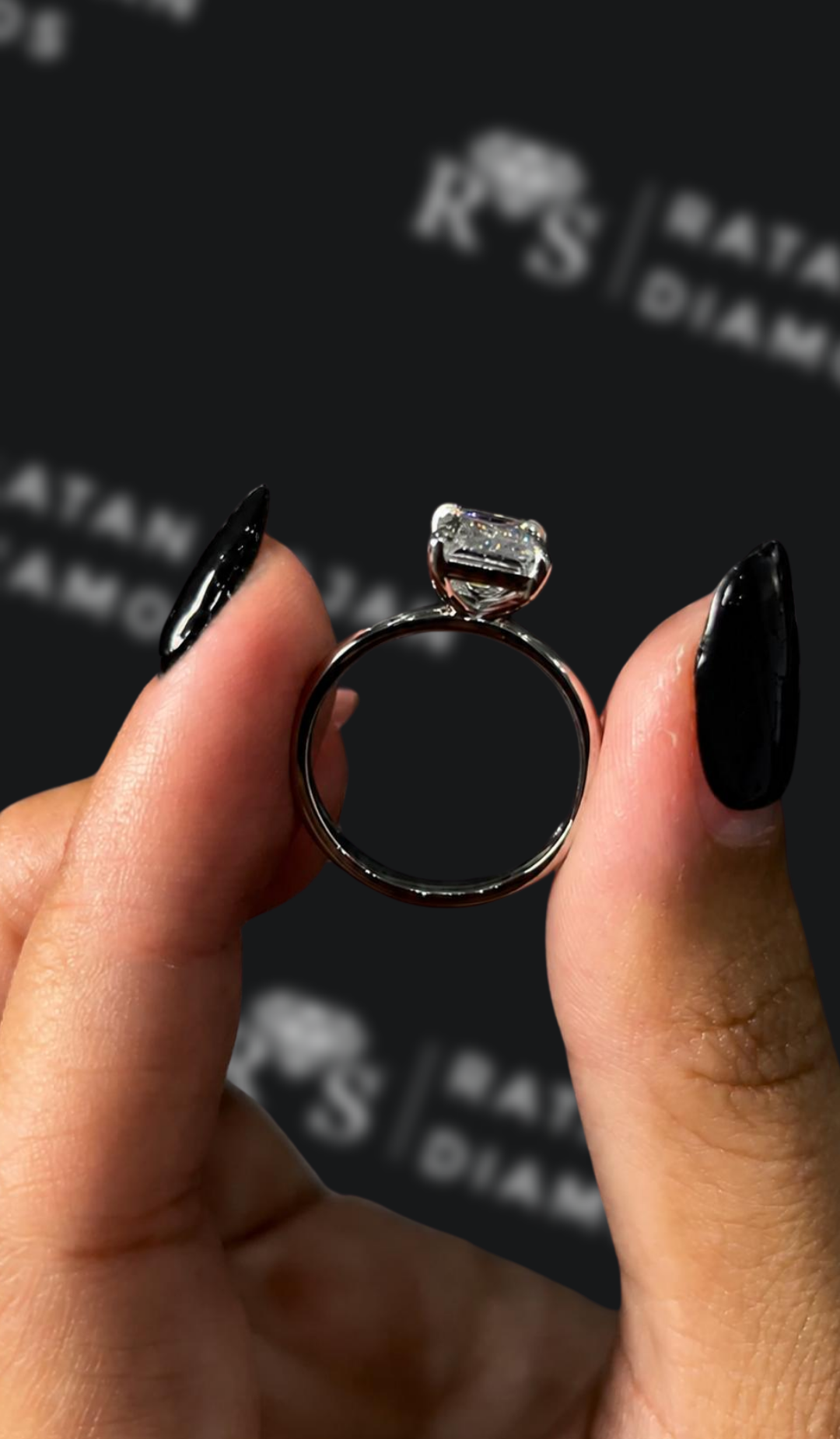 2 carat emerald cut natural diamond engagement ring by Ratan Sajan Diamonds Dubai