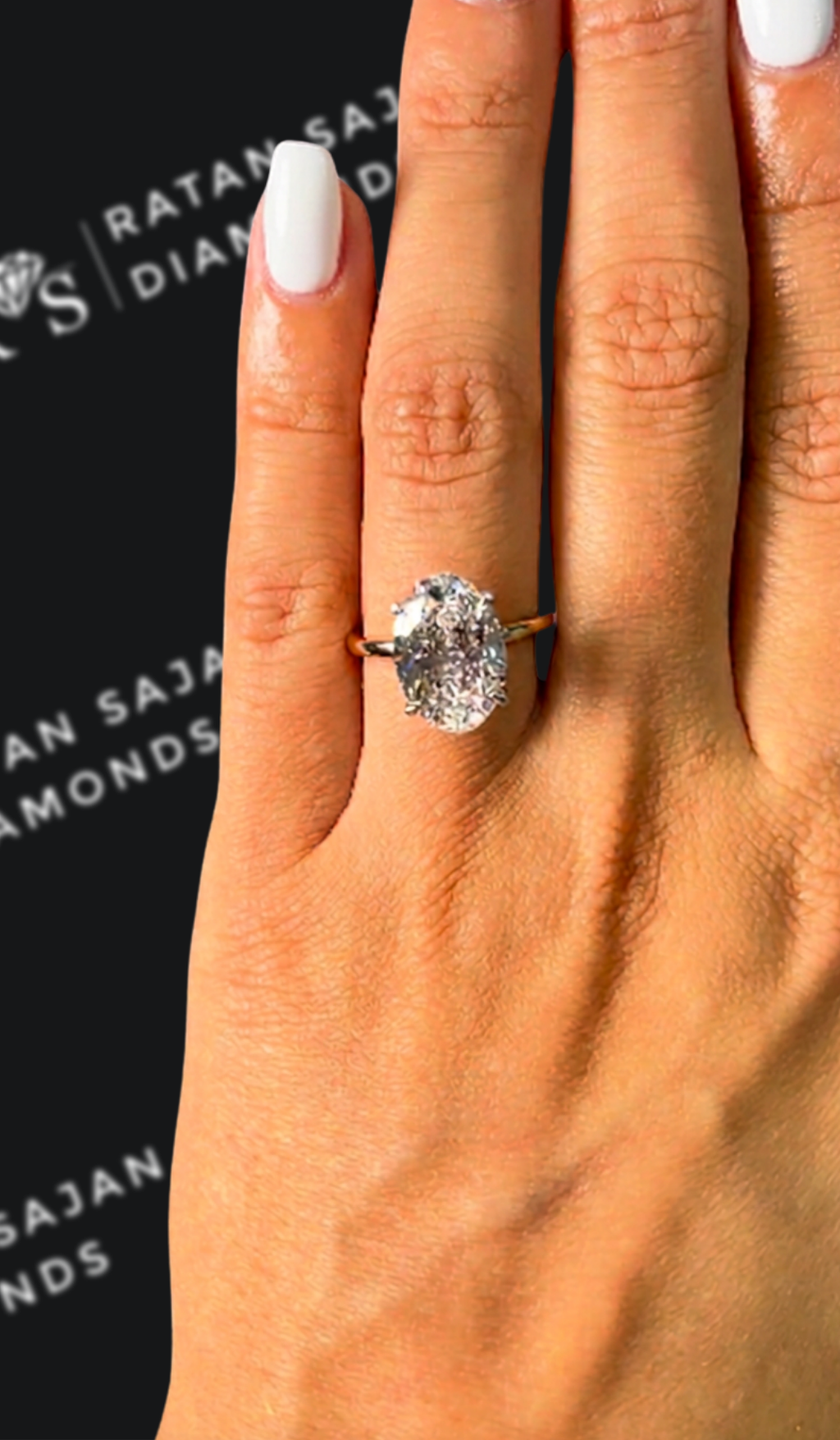 4.5 carat oval natural diamond engagement ring by Ratan Sajan Diamonds Dubai