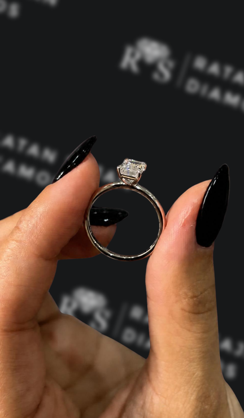 1 carat emerald cut natural diamond engagement ring by Ratan Sajan Diamonds Dubai