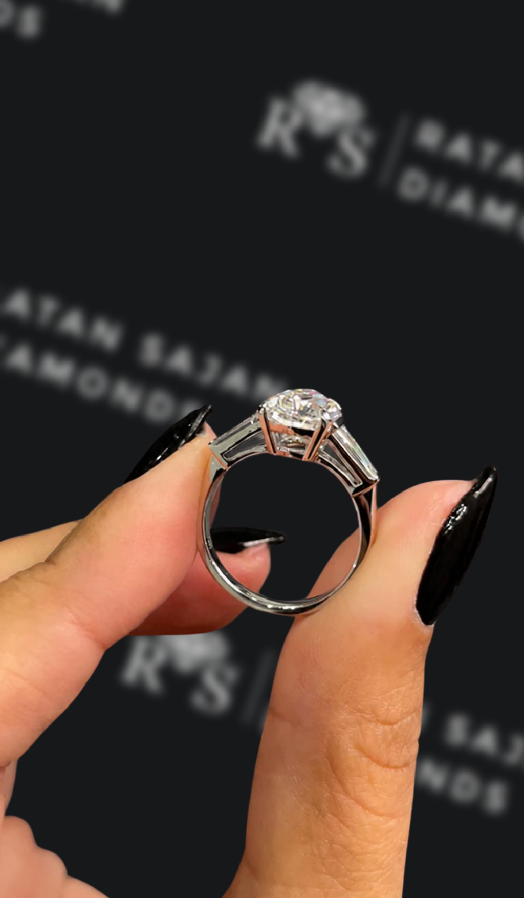 2.5 carat emerald cut natural diamond engagement ring by Ratan Sajan Diamonds Dubai