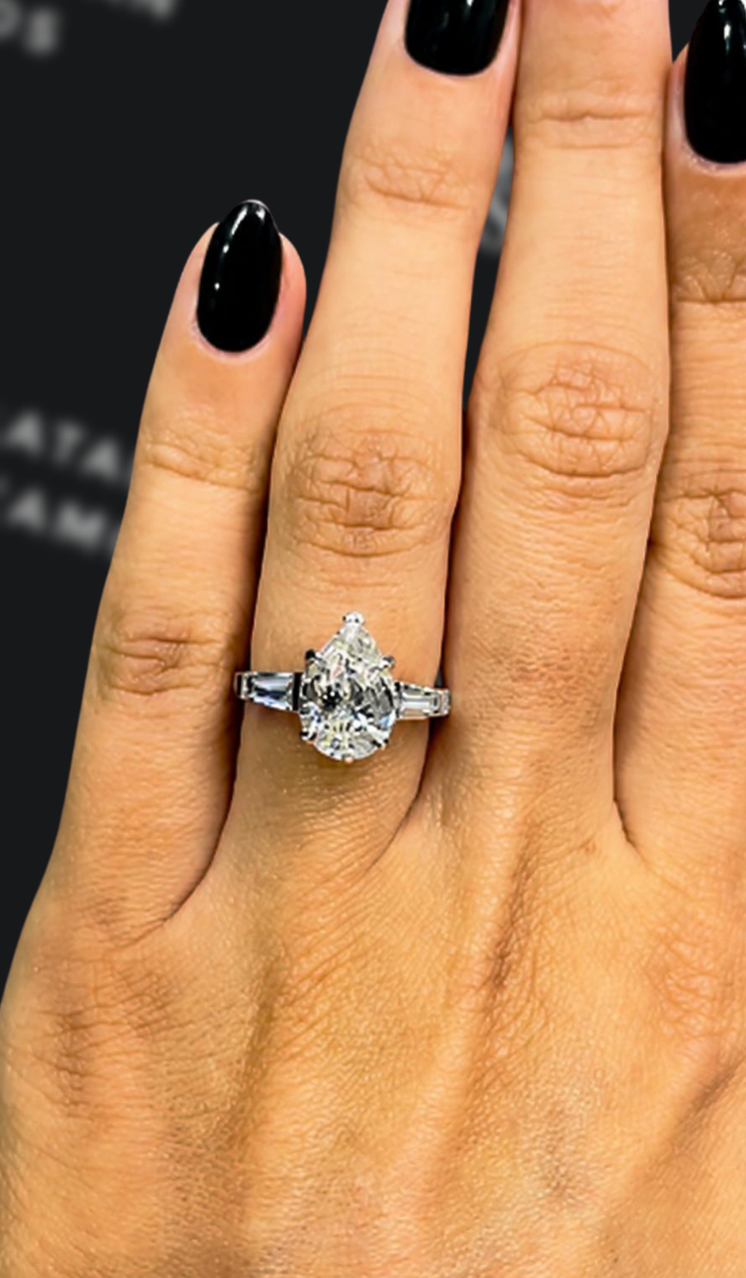 2.5 carat emerald cut natural diamond engagement ring by Ratan Sajan Diamonds Dubai