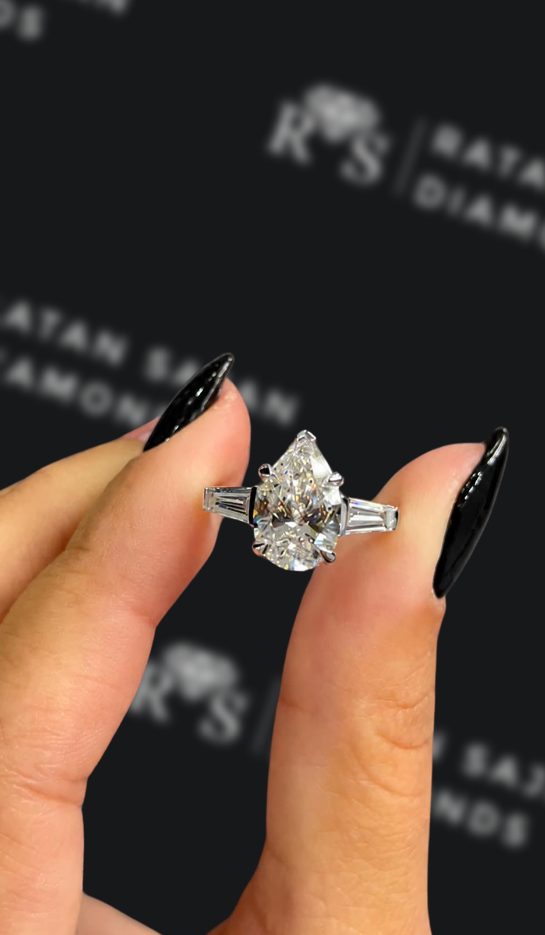 2.5 carat emerald cut natural diamond engagement ring by Ratan Sajan Diamonds Dubai