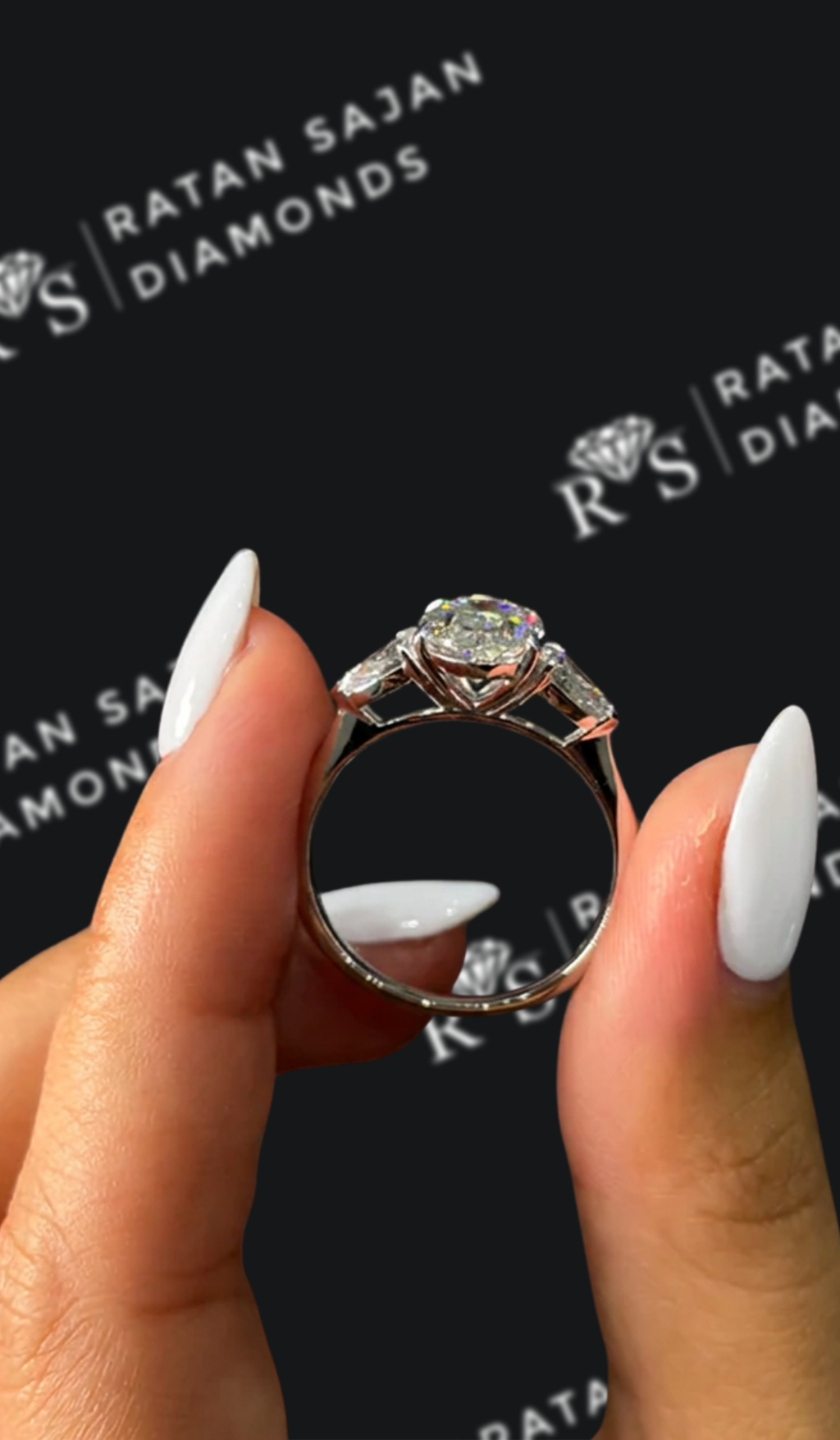 2.5 carat oval natural diamond engagement ring by Ratan Sajan Diamonds Dubai