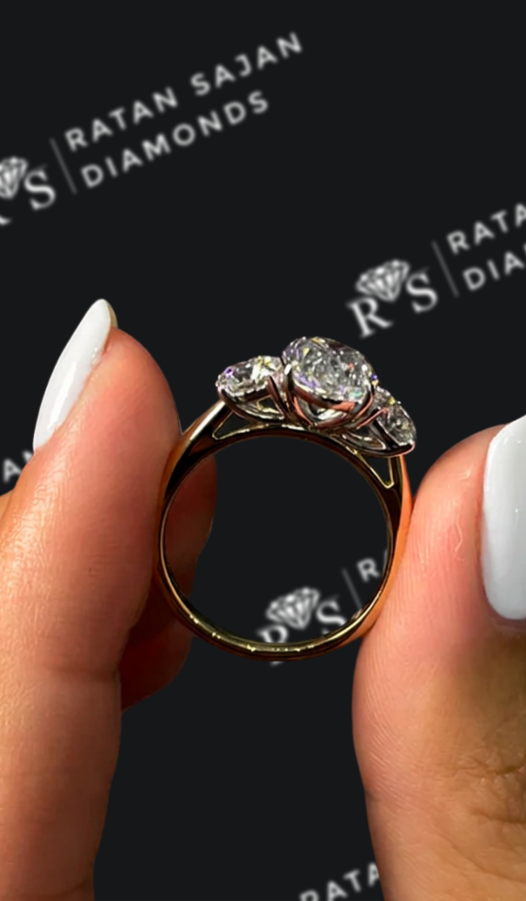 1.5 carat oval natural diamond engagement ring by Ratan Sajan Diamonds Dubai