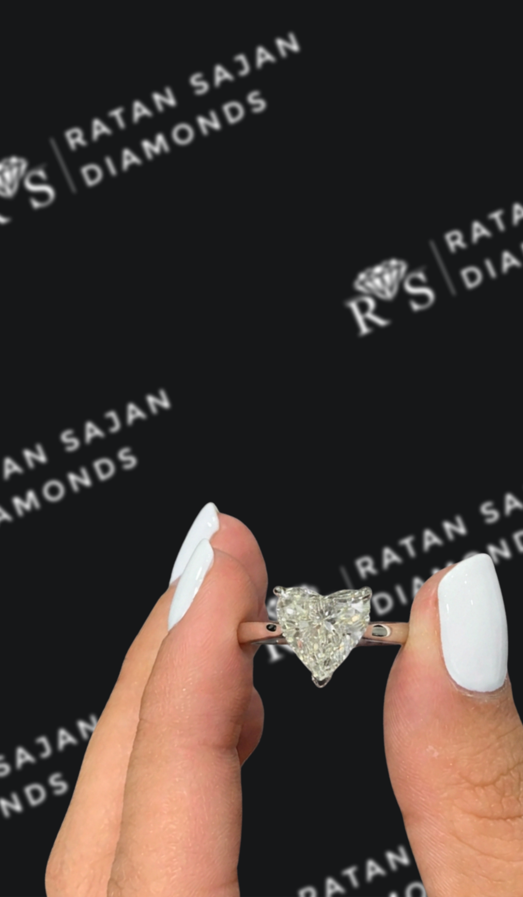 2.5 carat heart shaped natural diamond engagement ring by Ratan Sajan Diamonds Dubai