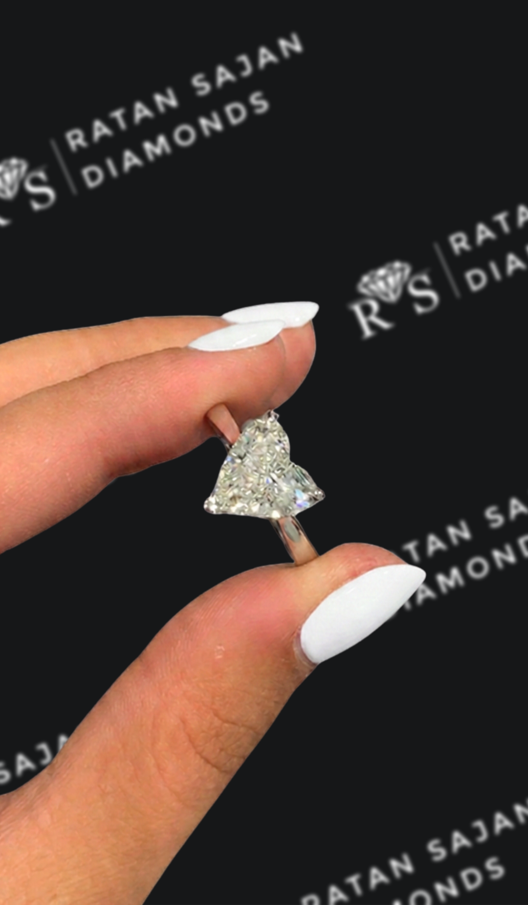 2.5 carat heart shaped natural diamond engagement ring by Ratan Sajan Diamonds Dubai