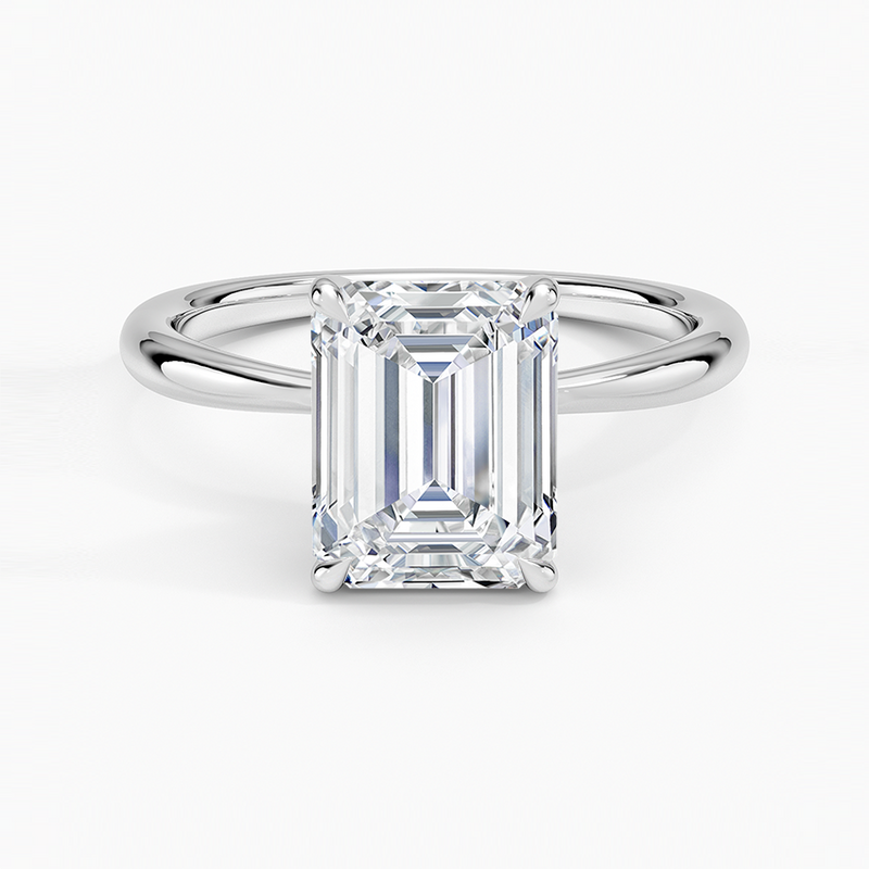 One and a half carat emerald cut natural diamond solitaire engagement ring